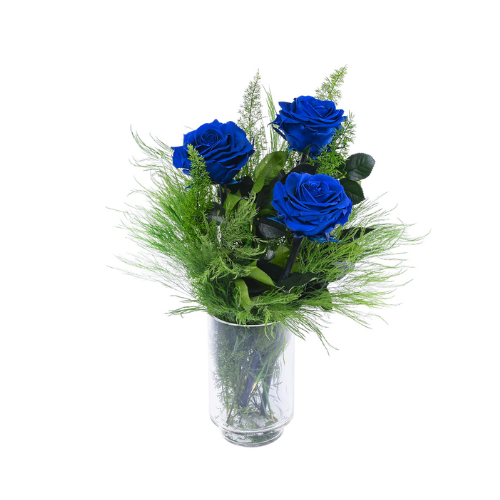 Arreglo en base de vidrio con 3 rosas premium preservadas azules